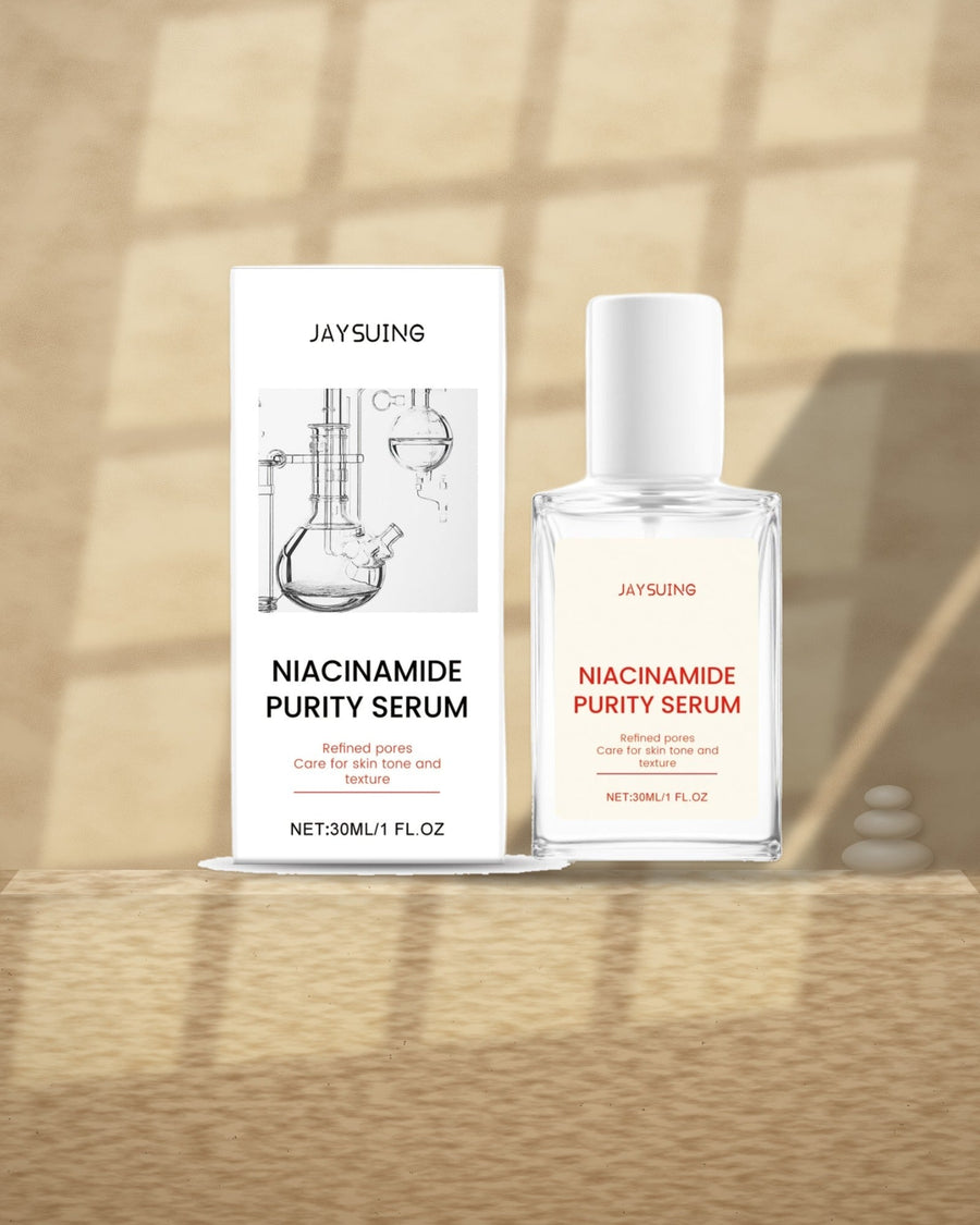 Niacinamide Purity Serum on a travertine ledge in window light