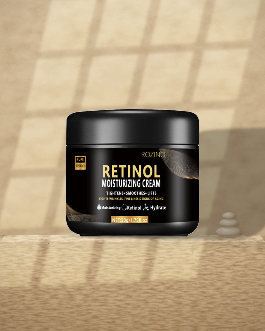 Retinol Moisturizing Face Cream on a travertine ledge in window light