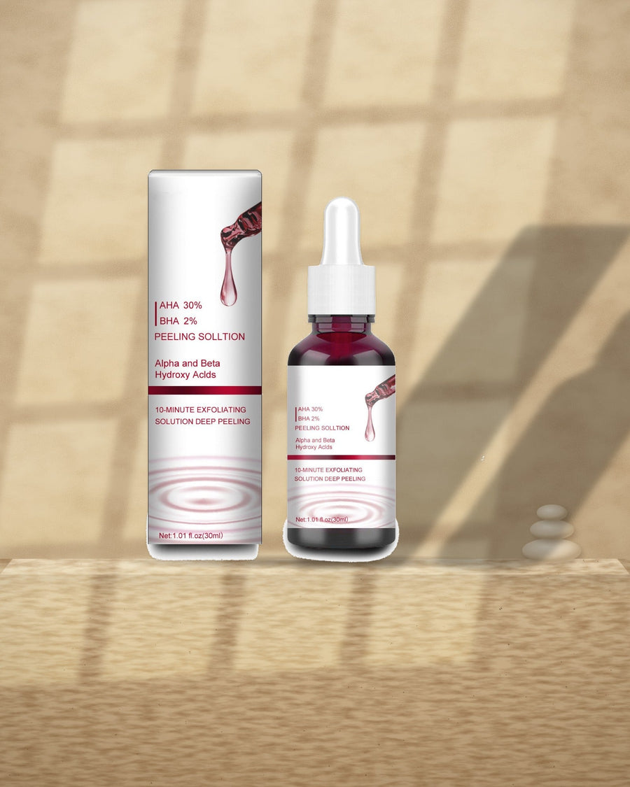 Salicylic Acid Exfoliating Serum on a travertine ledge in window light