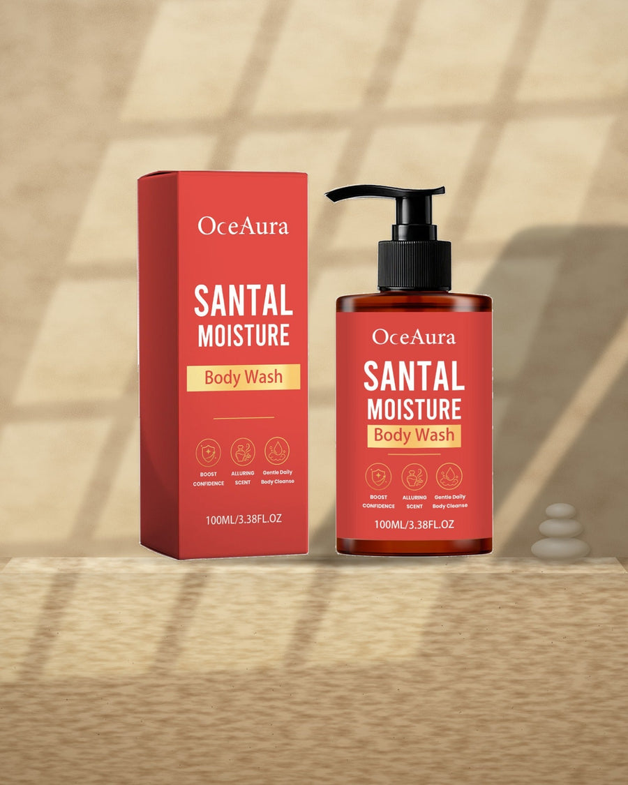 Santal Moisture Body Wash on a travertine ledge in window light