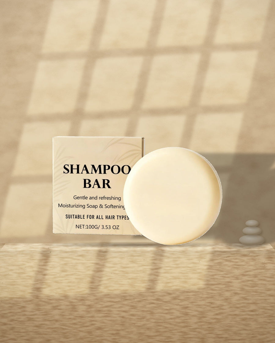 Coconut & Shea Shampoo Bar on a travertine ledge in window light