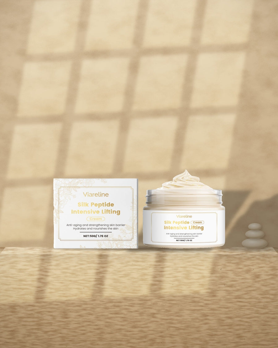 Silk Peptide Firming Cream on a travertine ledge in window light